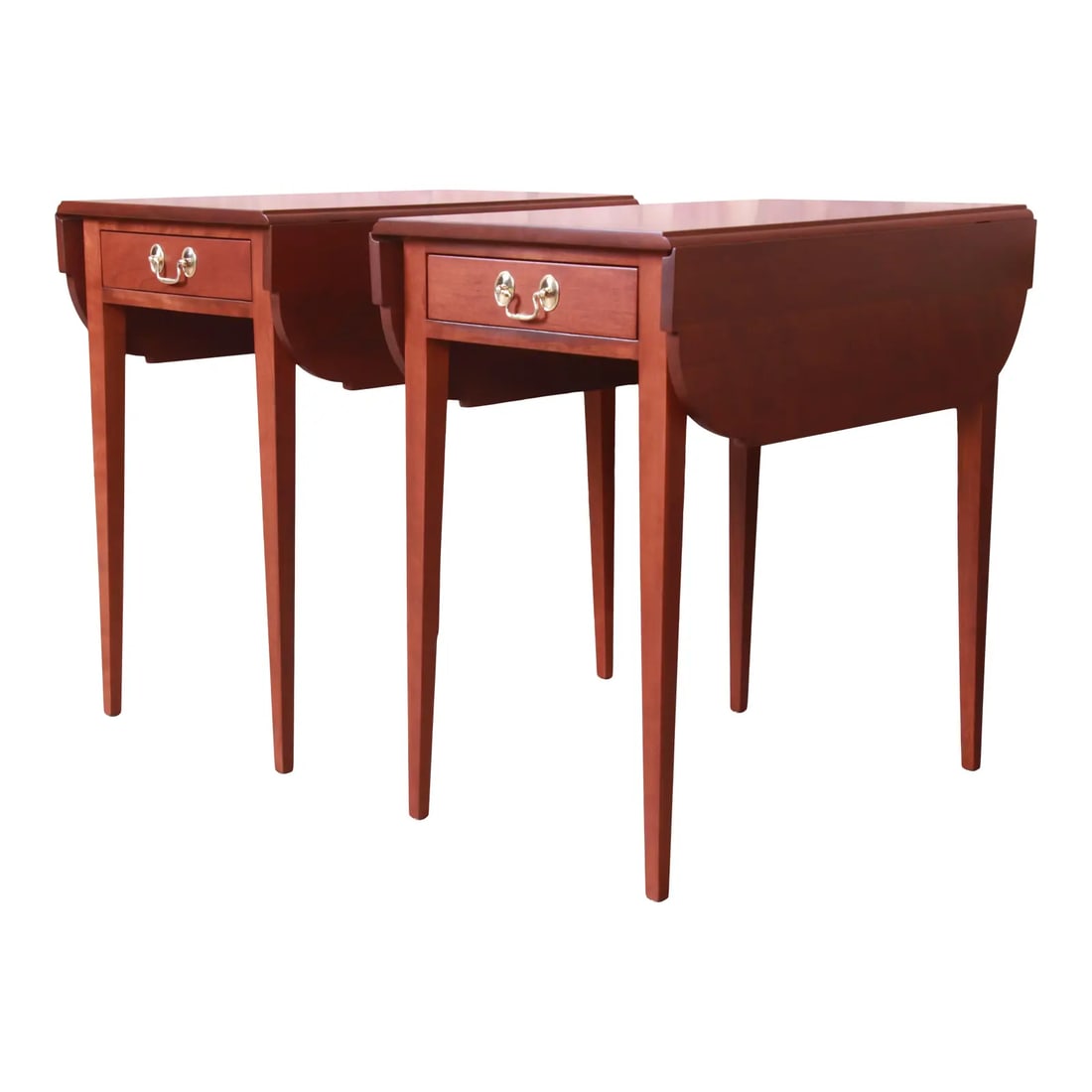 Stickley Federal Solid Cherry Wood Pembroke Tea Tables, Newly Refinished: A gorgeous pair of Federal style Pembroke nightstands, end tables, or tea tables By L. & J.G. Stickley USA, Late 20th Century Solid cherry wood, with original brass hardware. Measures: 17"W x 26"D x 2