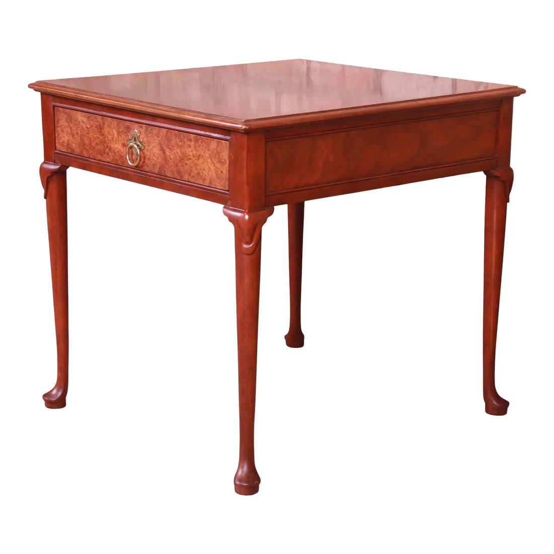 Baker Furniture Queen Anne Walnut and Burl Wood Tea Table: A gorgeous Queen Anne style occasional side table or nightstand By Baker Furniture USA, Late 20th Century Walnut, with burl wood drawer front and original brass hardware. Measures: 24"W x 24.75"D x 24