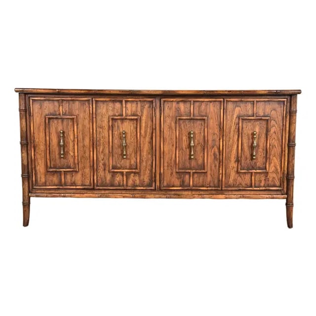 Mid-Century Hollywood Regency Chinoiserie Fruitwood Faux Bamboo Credenza by National Mt. Airy: An exceptional mid-century modern Hollywood Regency Chinoiserie faux bamboo sideboard or credenza By National Mount Airy Furniture Co. USA, Circa 1960s Sculpted bamboo form fruitwood, with original br