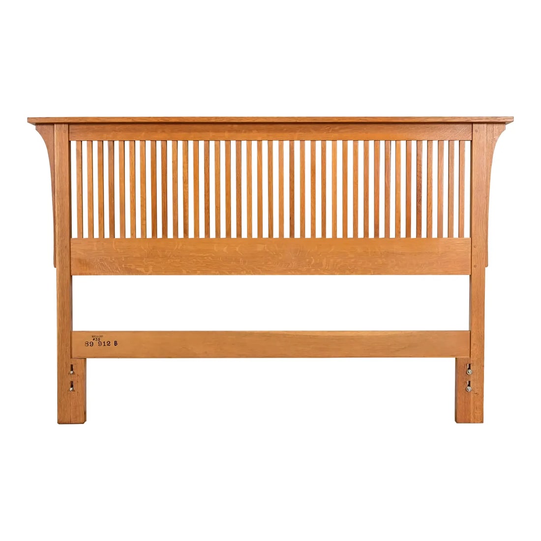 Stickley Mission Oak Arts & Crafts Queen Size Spindle Headboard: An exceptional Mission or Arts & Crafts quarter sawn oak queen size spindle headboard By L. & J.G. Stickley USA, Late 20th Century Measures: 70.5"W x 4"D x 45.25"H. Very good original vintage conditio