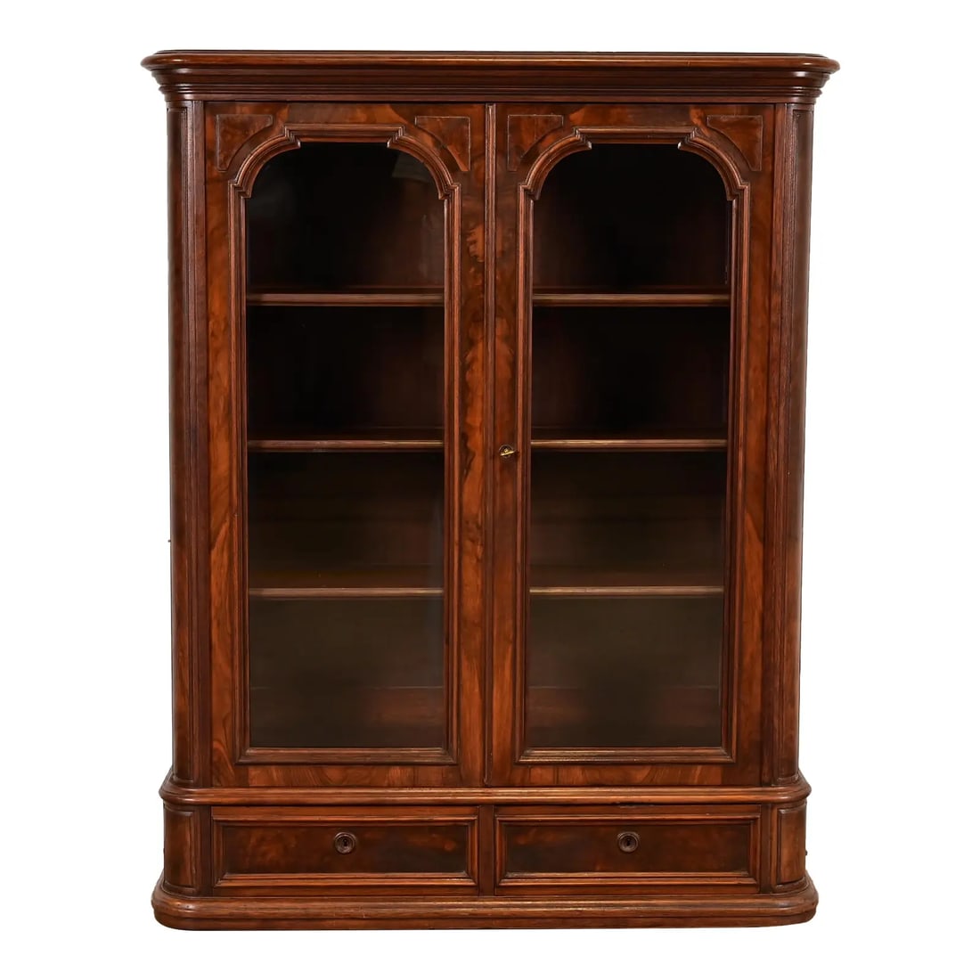 Herter Brothers Style Antique Victorian Burled Walnut Glass Front Bookcase, Circa 1880s: A beautiful antique Victorian bookcase cabinet In the manner of Herter Brothers USA, Circa 1880s Gorgeous burled walnut, with glass front doors. Cabinet locks, and key is included. Measures: 43.5"W x