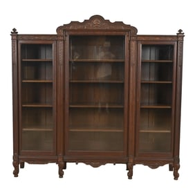 R. J. Horner Style Antique Victorian Carved Oak Triple Bookcase, Circa 1890s