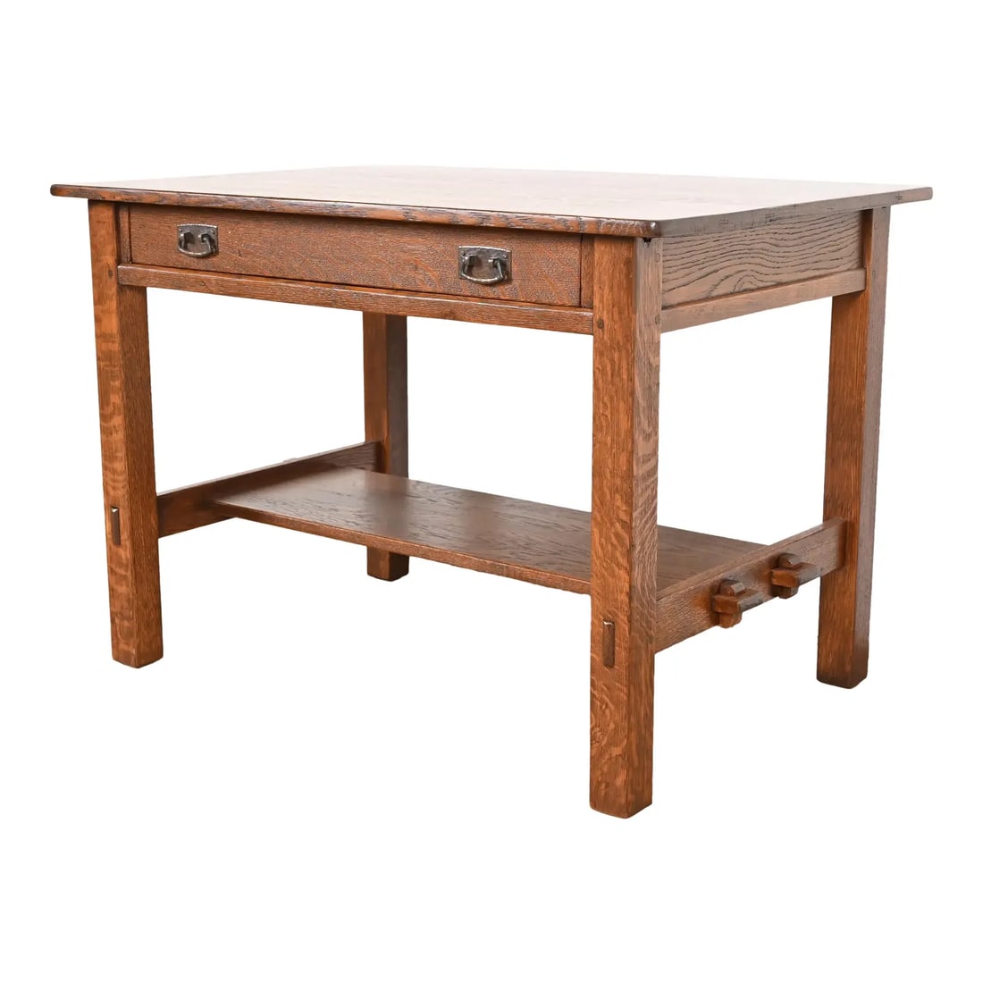 Antique L. & J. G. Stickley Mission Oak Arts & Crafts Writing Desk or Library Table, Newly Restored: An exceptional antique Mission or Arts & Crafts writing desk or library table By L. & J.G. Stickley USA, Circa 1900 Solid quarter sawn oak, with original hammered copper hardware. Measures: 42"W x 28.