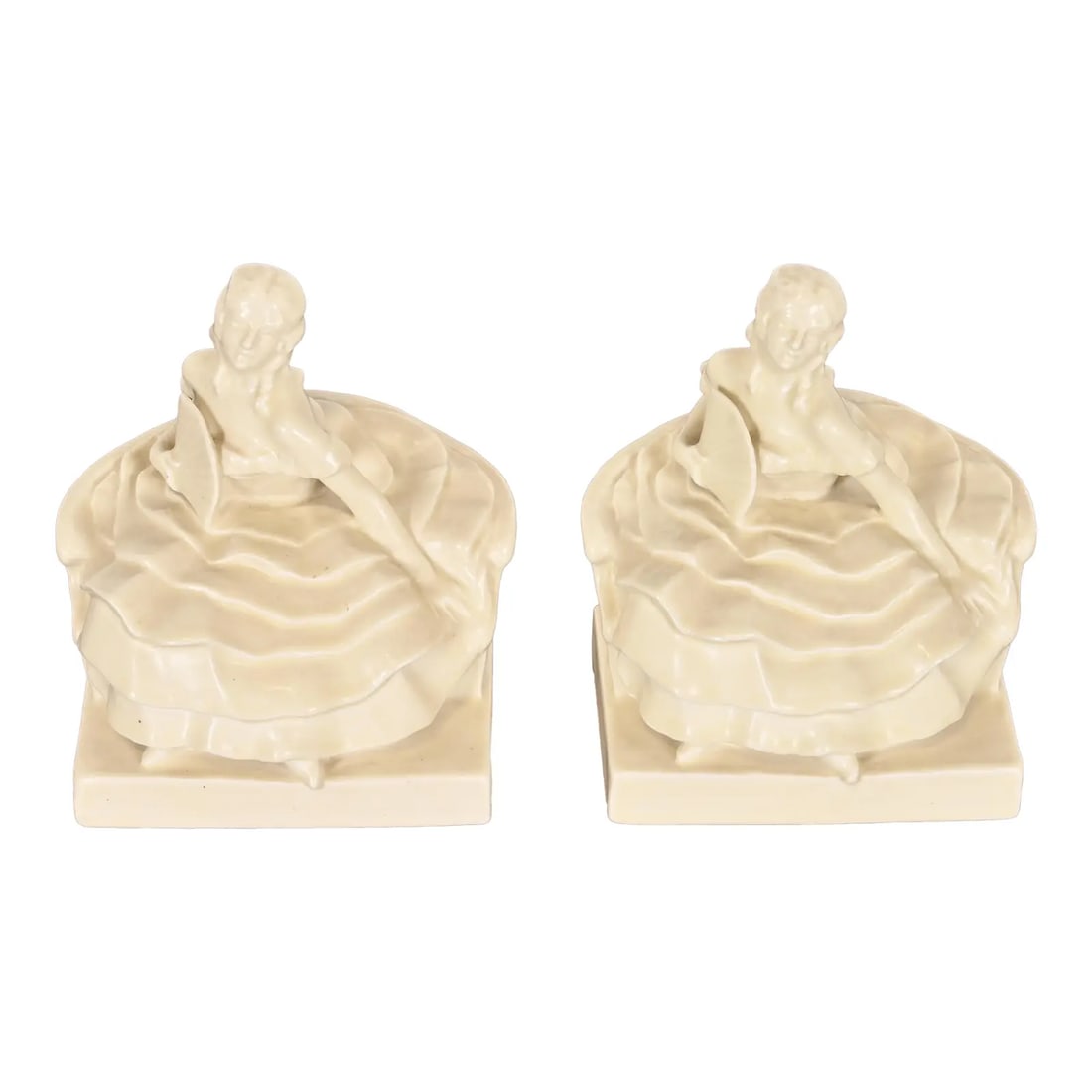 Rookwood Pottery Arts & Crafts Glazed Ceramic Victorian Lady Bookends, 1931: A gorgeous pair of Arts & Crafts period large glazed art pottery bookends with Victorian lady design By Rookwood Pottery USA, 1931 Glazed ceramic in a beautiful cream color. Measures: 6"W x 4.75"D x 7