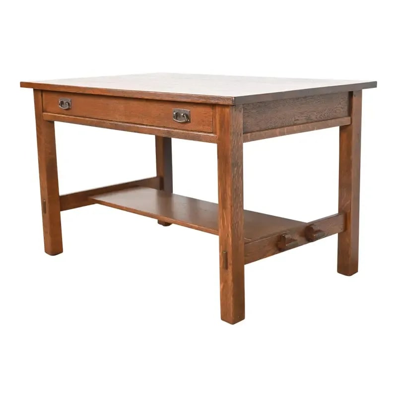 Antique Stickley Mission Oak Arts & Crafts Writing Desk or Library Table, Newly Restored: An exceptional antique Mission or Arts & Crafts writing desk or library tableBy L. & J.G. StickleyUSA, Circa 1900Solid quarter sawn oak, with original hammered copper hardware.Measures: 48"W x 30"D x