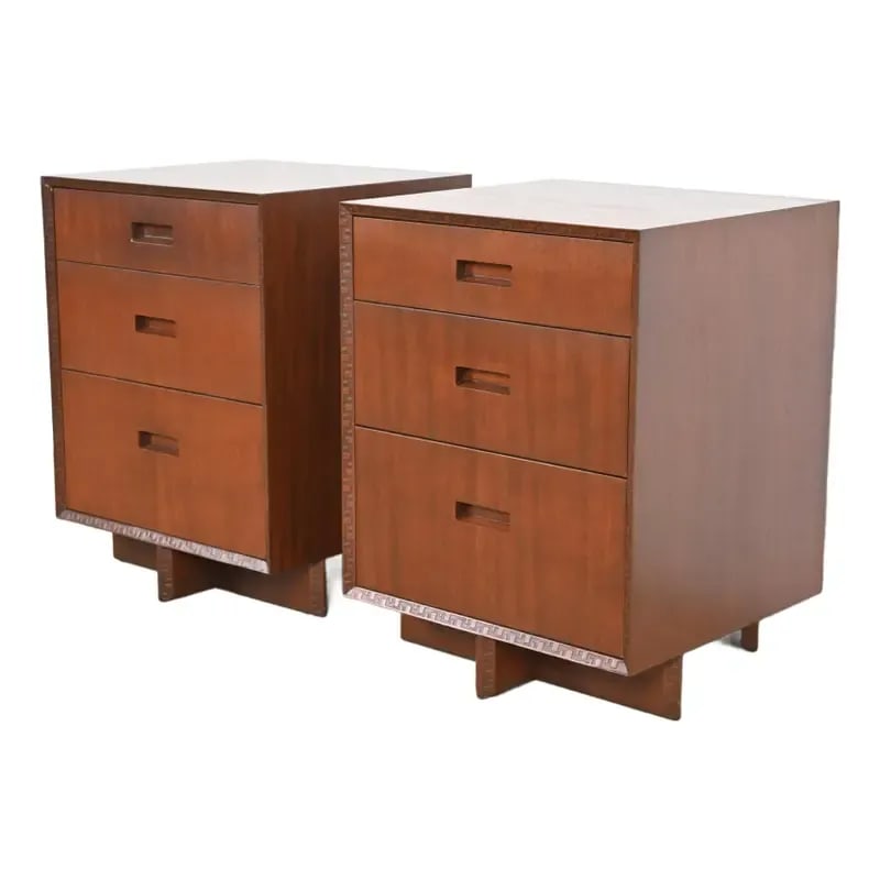 Frank Lloyd Wright for Heritage Henredon Taliesin Mahogany Bedside Chests, Newly Refinished: A rare and exceptional pair of Mid-Century Modern "Taliesin" bedside chestsBy Frank Lloyd Wright for Heritage HenredonUSA, 1950sEach measures: 21.5"W x 20"D x 28"H.Mahogany, with iconic carved