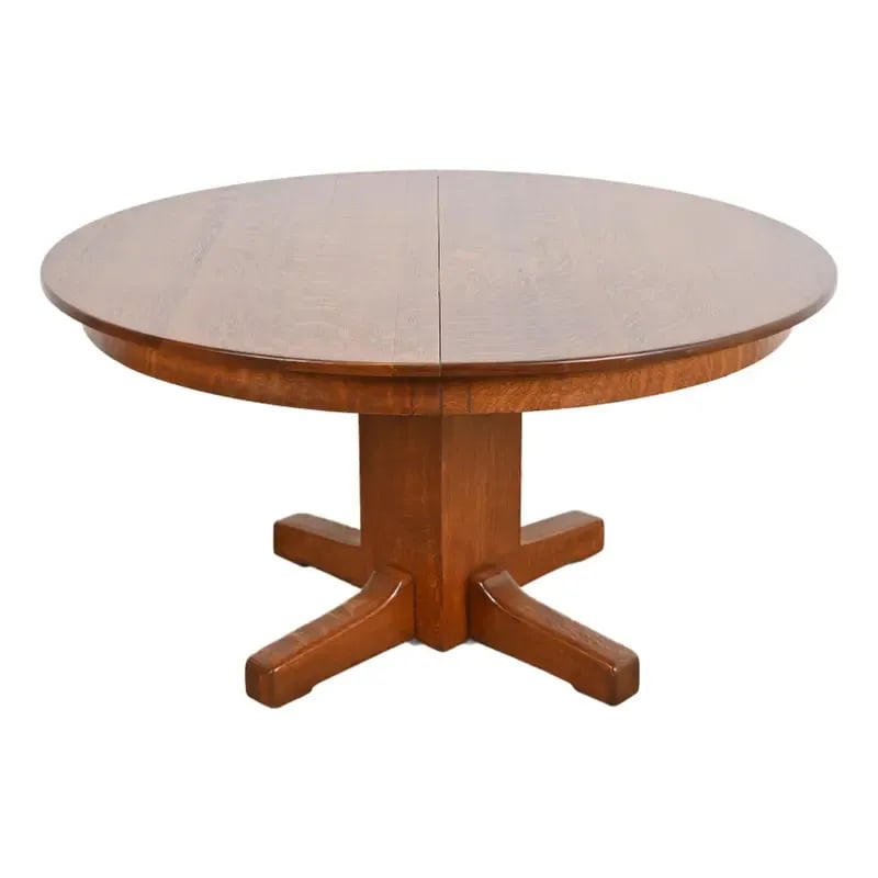 Limbert Antique Mission Oak Arts & Crafts Pedestal Extension Dining Table, Newly Refinished: An outstanding Mission or Arts & Crafts period quarter sawn oak pedestal extension dining table By Limbert USA, Circa 1900 Measures: 54"W x 54"D x 29.13"H. Extends up to 76"W with two 11" leaves. Prof