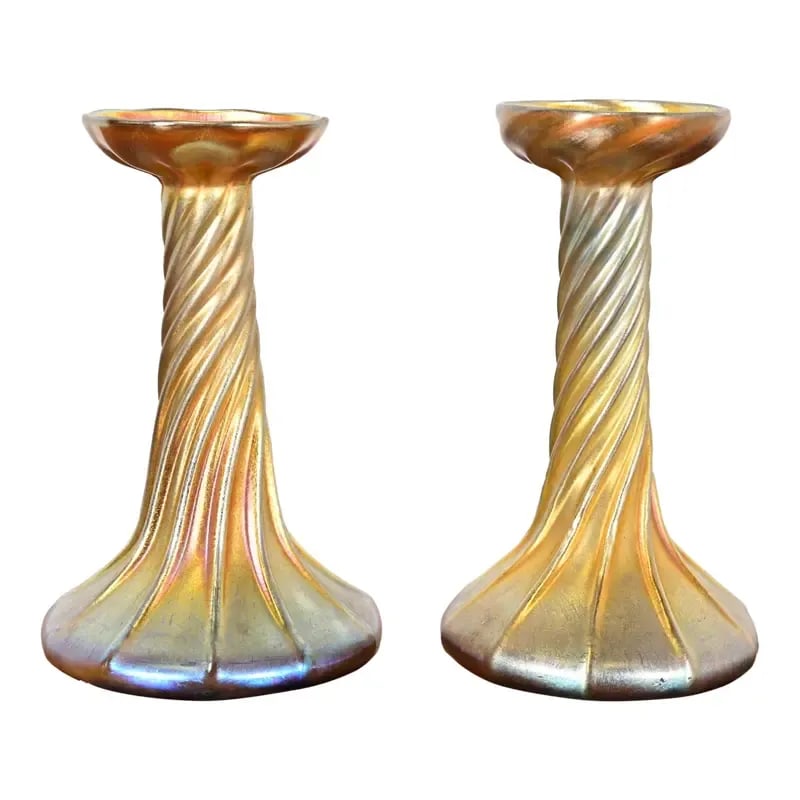 Louis Comfort Tiffany Favrile Iridescent Art Glass Candlesticks, Pair: A gorgeous pair of Arts & Crafts or Art Nouveau period Favrile iridescent art glass candlesticks By Louis Comfort Tiffany for Tiffany Studios (each signed to the underside) USA, Circa 1910 Measures: C