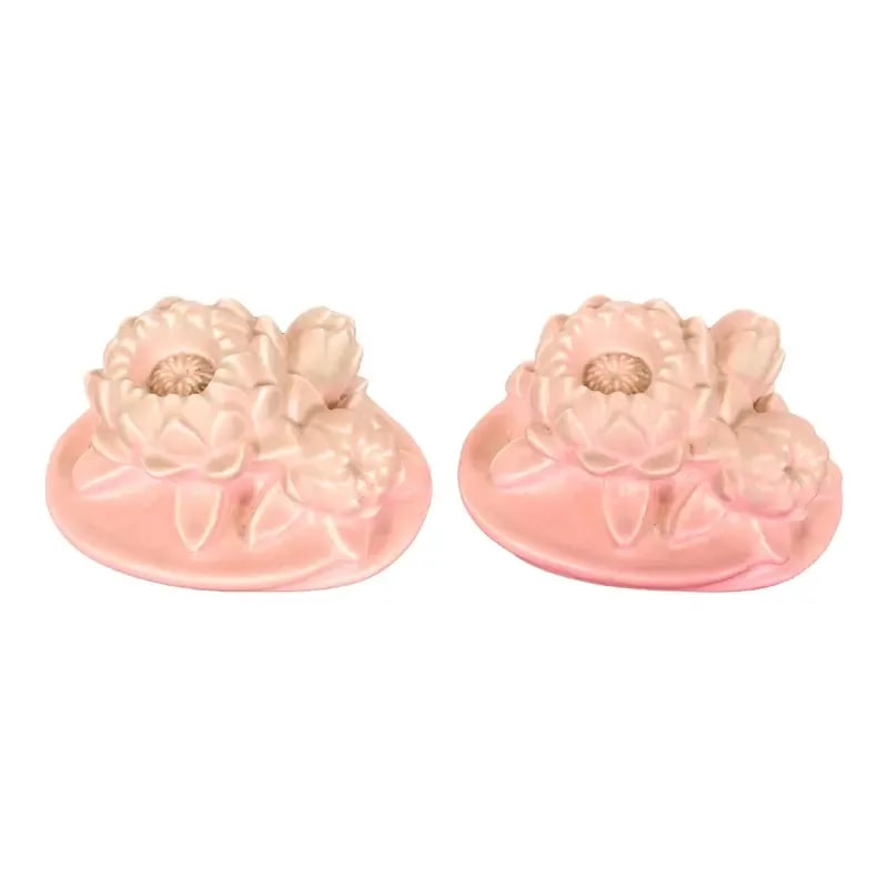 Rookwood Pottery Art Nouveau Glazed Ceramic Pink Lotus Flower Bookends, 1930: A gorgeous pair of Arts & Crafts or Art Nouveau period glazed art pottery bookends with lotus flower design By Rookwood Pottery USA, 1930 Glazed ceramic in a beautiful light pink color. Each measures:
