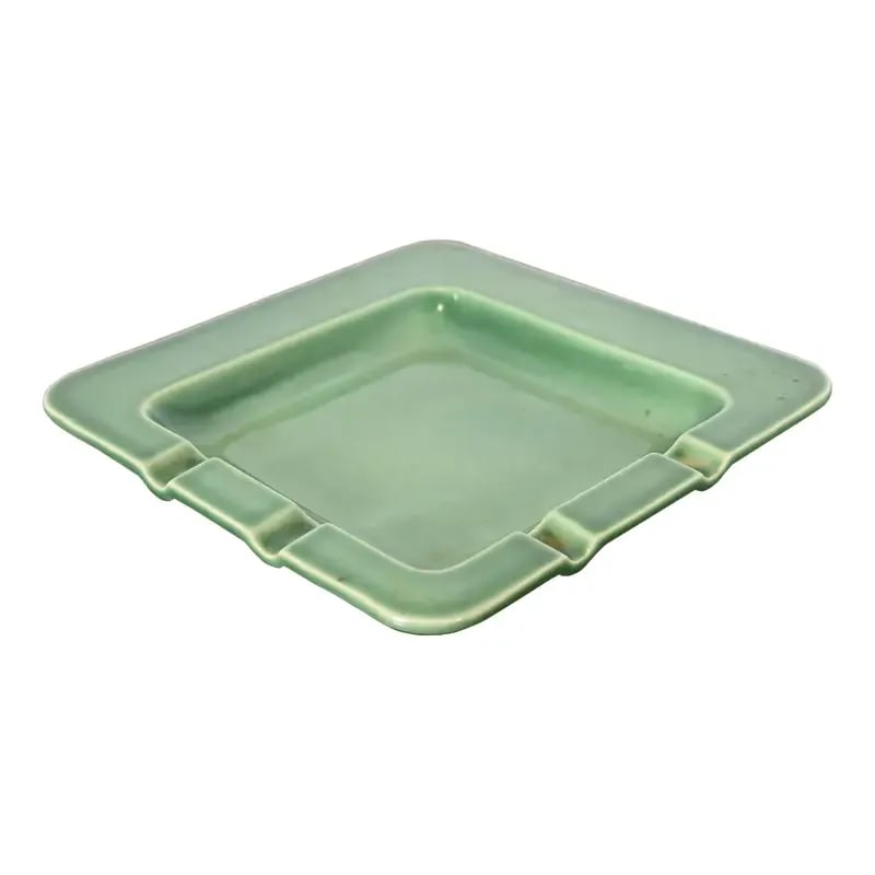 Rookwood Pottery Mid-Century Large Glazed Ceramic Ash Tray, 1955: A gorgeous Arts & Crafts or Mid-Century Modern glazed art pottery ashtray or catchall By Rookwood Pottery USA, 1955 Glazed ceramic in a handsome green color. Measures: 8.75"W x 8.75"D x 1"H. Very good