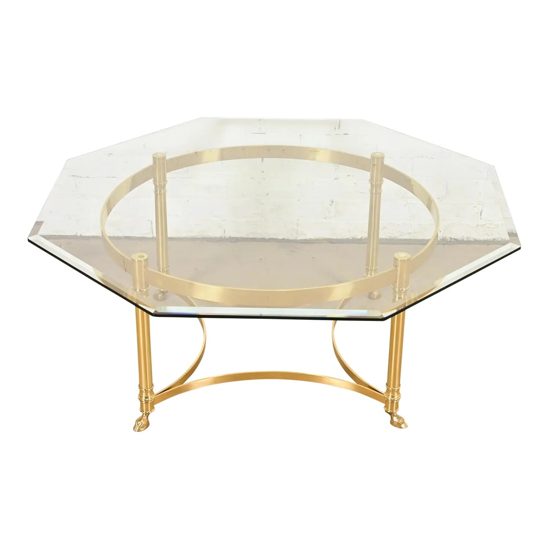 Labarge Hollywood Regency Brass and Glass Hooved Feet Cocktail Table, Circa 1960s: A gorgeous mid-century modern Hollywood Regency octagonal coffee table or cocktail table By Labarge USA, Circa 1960s Solid brass frame, with beveled glass top. Measures: 41.75"W x 41.75"D x 17"H. Very