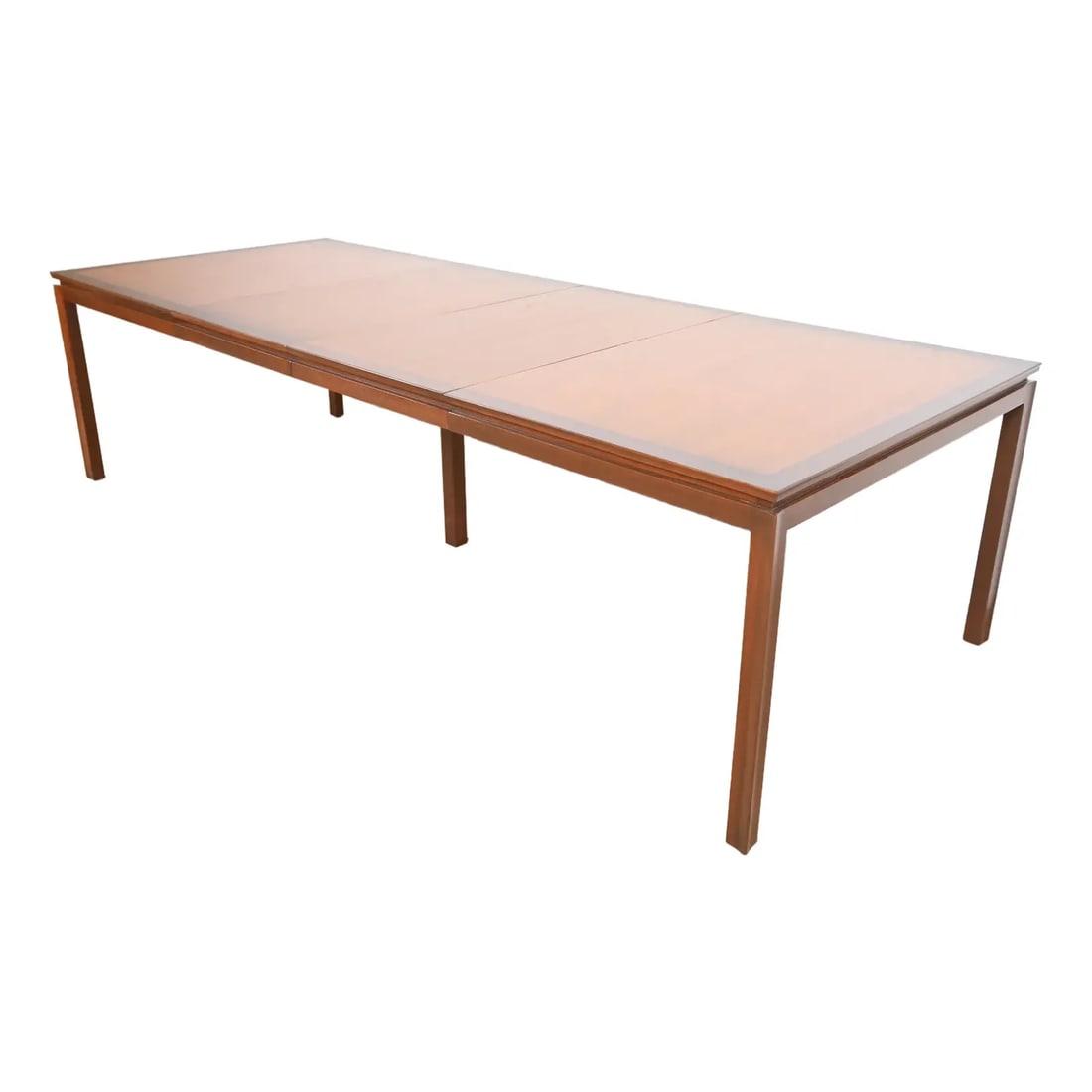 Edward Wormley for Dunbar Mid-Century Modern Walnut Extension Dining Table, Newly Refinished: An exceptional Mid-Century Modern walnut extension dining tableBy Edward Wormley for Dunbar FurnitureUSA, 1950sMeasures: 66"W x 44.25"D x 29.5"H. Extends up to 114"W with two 24"