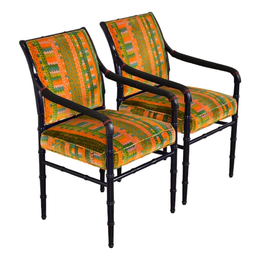 Mid-Century Hollywood Regency Ebonized Faux Bamboo Armchairs With Jack Lenor Larsen Upholstery, Pair: A gorgeous pair of mid-century Hollywood Regency armchairs or club chairs USA, Circa 1970s Ebonized bamboo form walnut frames, with Jack Lenor Larsen upholstered seats and backs. Measures: 21"W x 23.7