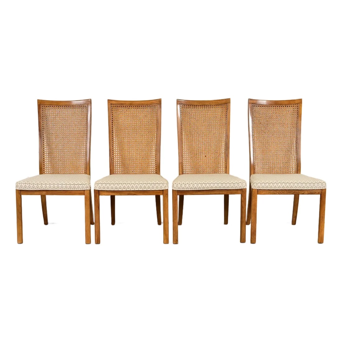 Drexel Heritage Mid-Century Modern Walnut and Cane High Back Dining Chairs, Set of Four: A gorgeous set of four Mid-Century Modern high back side chairs or dining chairs By Drexel Heritage USA, Circa 1980s Sculpted walnut frames, with cane backs and upholstered seats. Measures: 21.25"W x