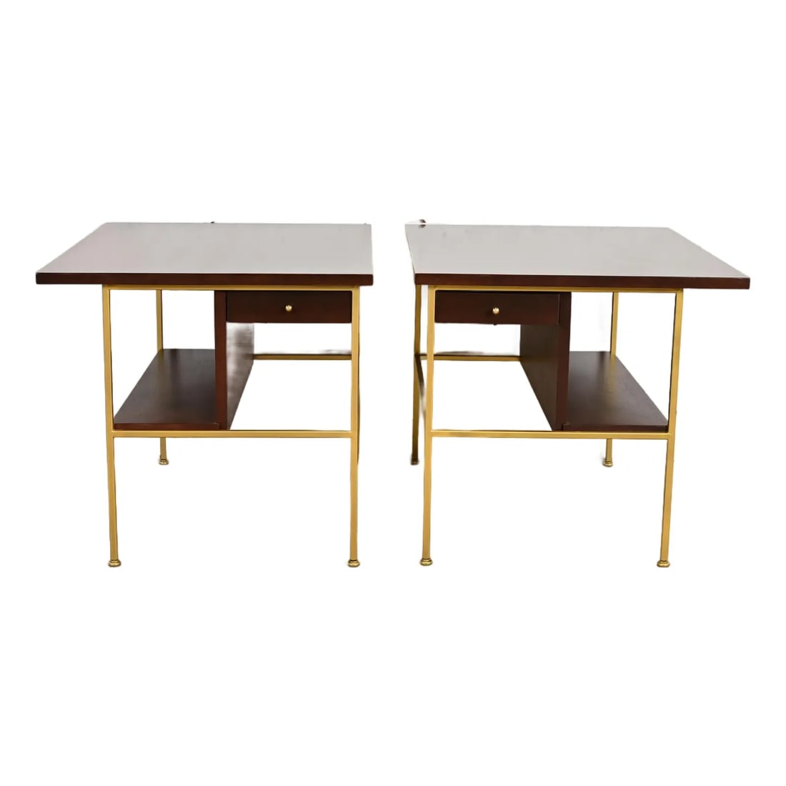 Paul McCobb Irwin Collection Mahogany and Brass Nightstands or End Tables, Newly Refinished: An outstanding pair of Mid-Century Modern bedside tables or occasional side tables By Paul McCobb for Directional and produced by Calvin Furniture, "Irwin Collection" USA, 1950s Mahogany, with brass l