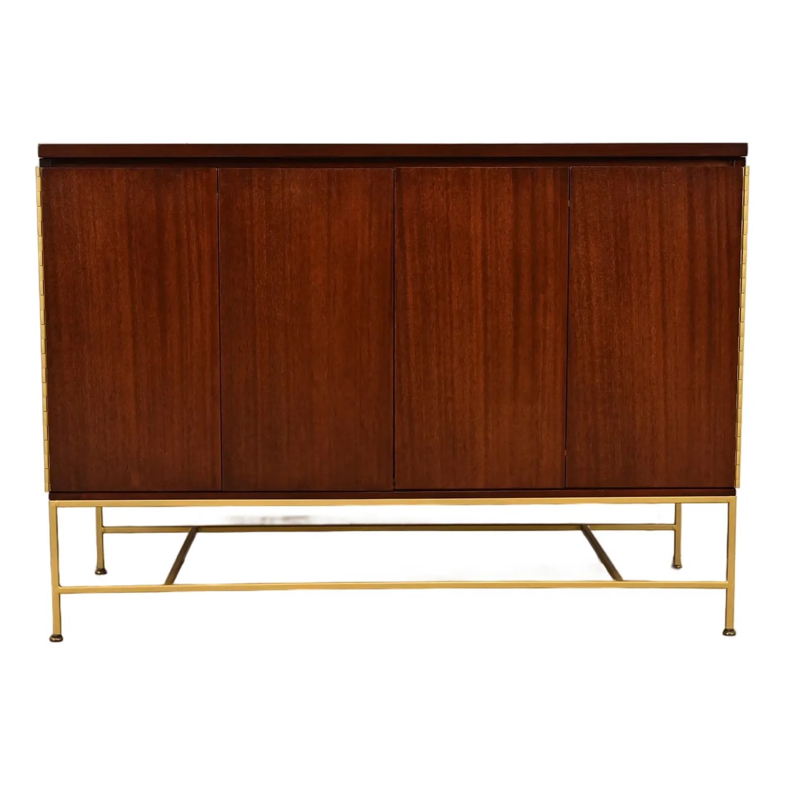 1950s Paul McCobb Irwin Collection Mahogany and Brass Sideboard, Credenza, or Bar Cabinet: An outstanding Mid-Century Modern sideboard, credenza, dresser, or bar cabinet By Paul McCobb for Directional and produced by Calvin Furniture, "Irwin Collection" USA, 1950s Mahogany, with brass legs