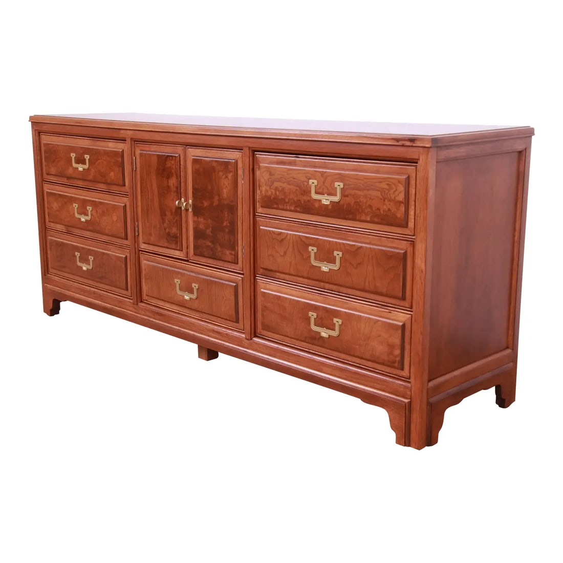 American of Martinsville Hollywood Regency Campaign Burled Walnut Dresser, Newly Refinished: An exceptional mid-century modern Hollywood Regency Campaign style dresser or credenza By American of Martinsville USA, Circa 1960s Walnut, with burled walnut banding and drawer front, and original br