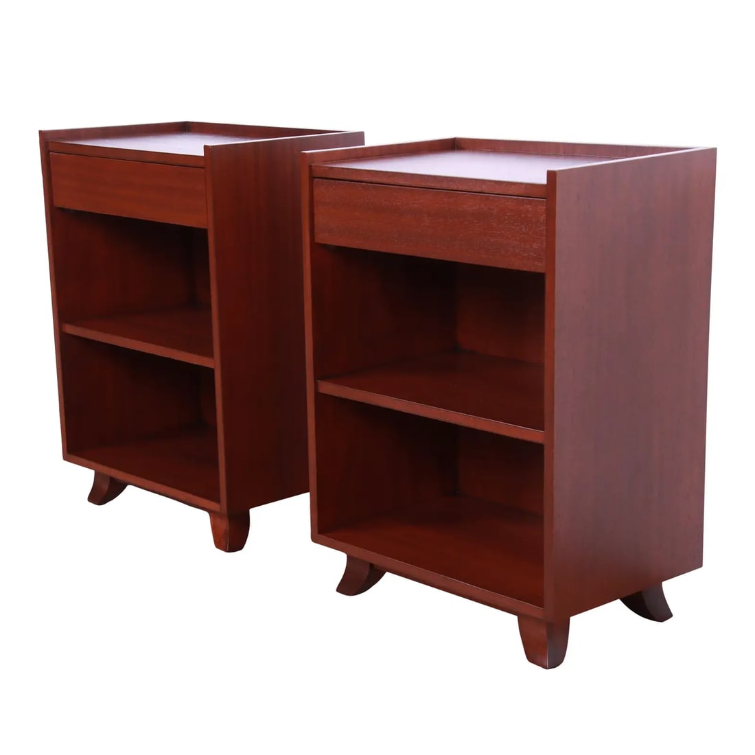 Gilbert Rohde for Herman Miller Art Deco Mahogany Nightstands, Newly Refinished: A gorgeous pair of Art Deco or mid-century modern mahogany nightstands By Gilbert Rohde for Herman Miller USA, 1930s Measures: 18"W x 12"D x 25.5"H. Newly refinished. Very good condition. See less