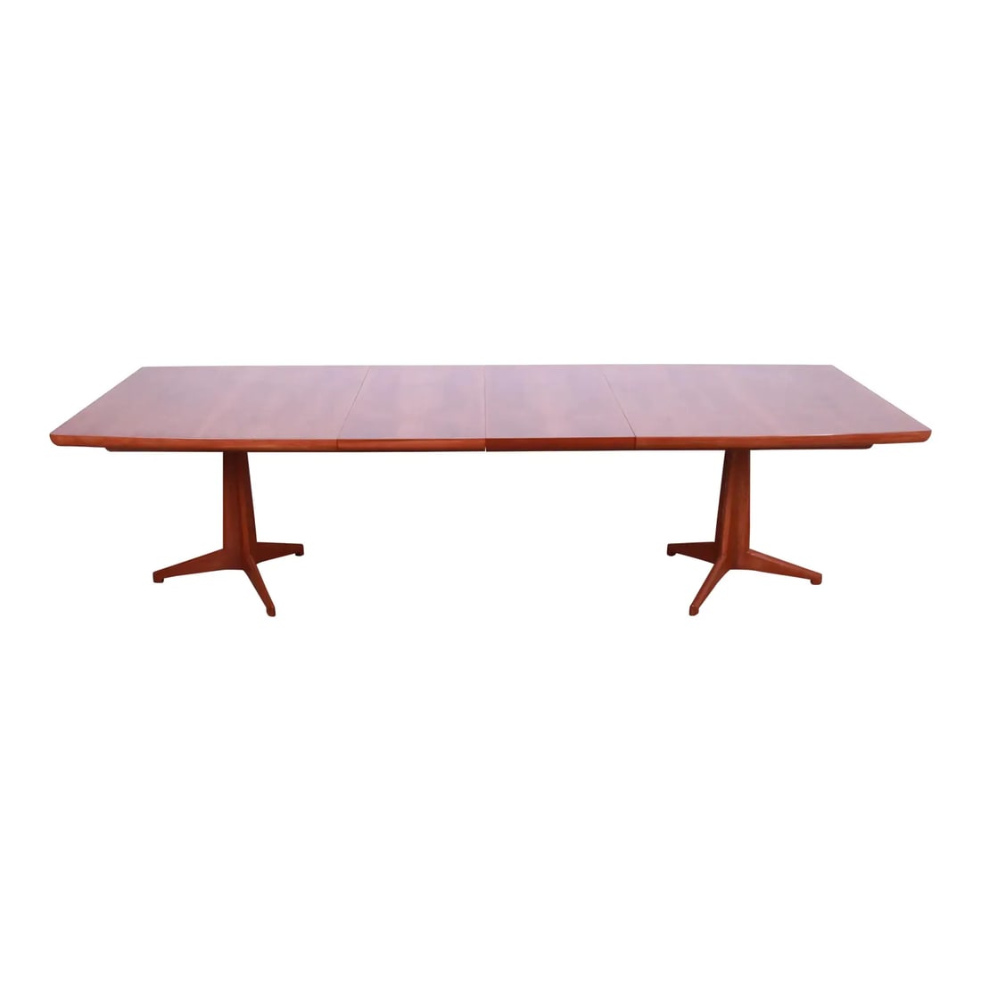 John Widdicomb Mid-Century Modern Sculpted Walnut Double Pedestal Extension Dining Table: An exceptional mid-century modern boat-shaped double pedestal extension dining table By John Widdicomb USA, 1950s Stunning book-matched figured walnut top, with sculpted solid walnut pedestals. Measur