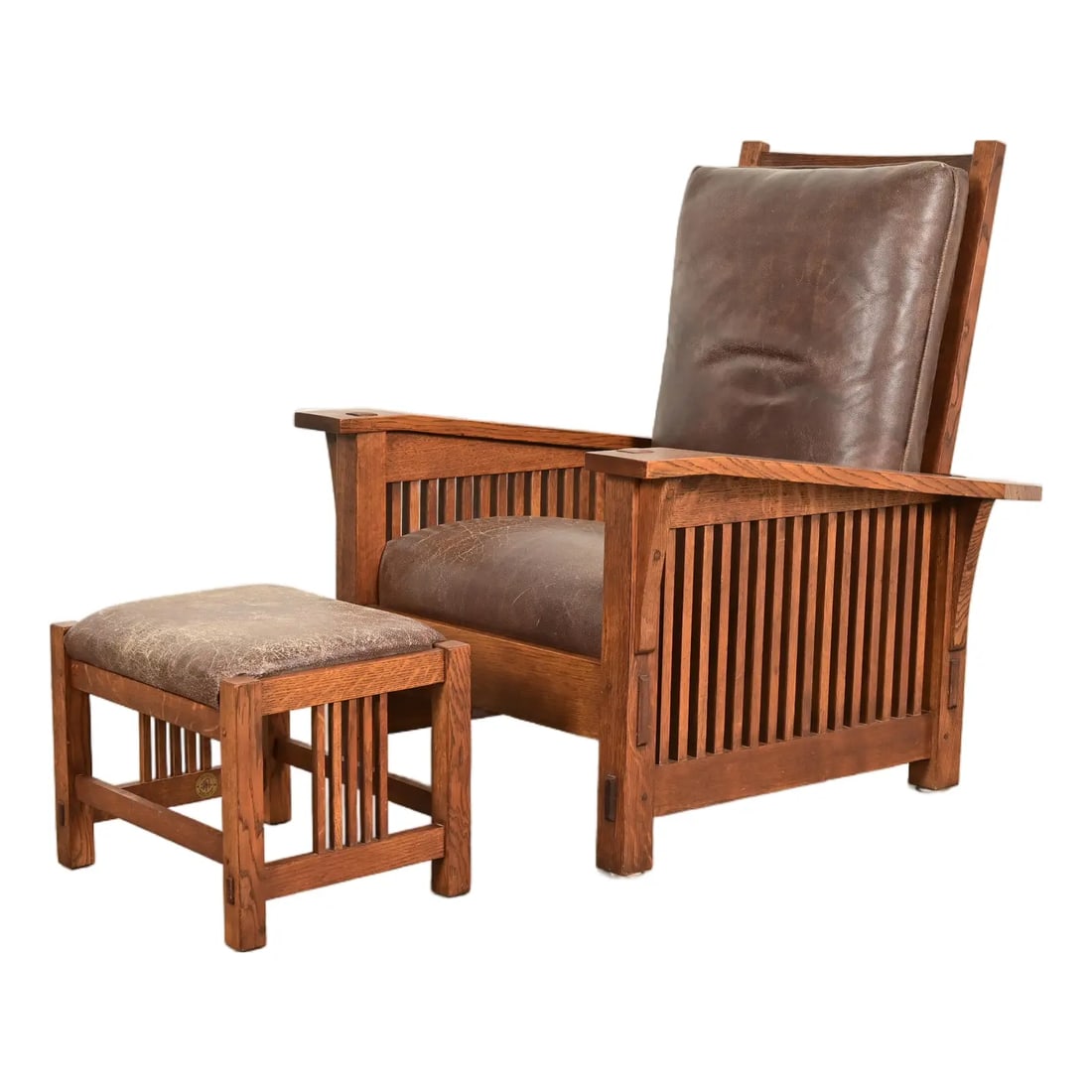 Stickley Mission Oak Arts & Crafts Reclining Morris Lounge Chair With Ottoman: An exceptional Mission or Arts & Crafts Morris reclining lounge chair with ottoman By L. & J.G. Stickley USA, 1997 Solid quarter sawn oak frame, with leather upholstered seat and back cushions. Measur