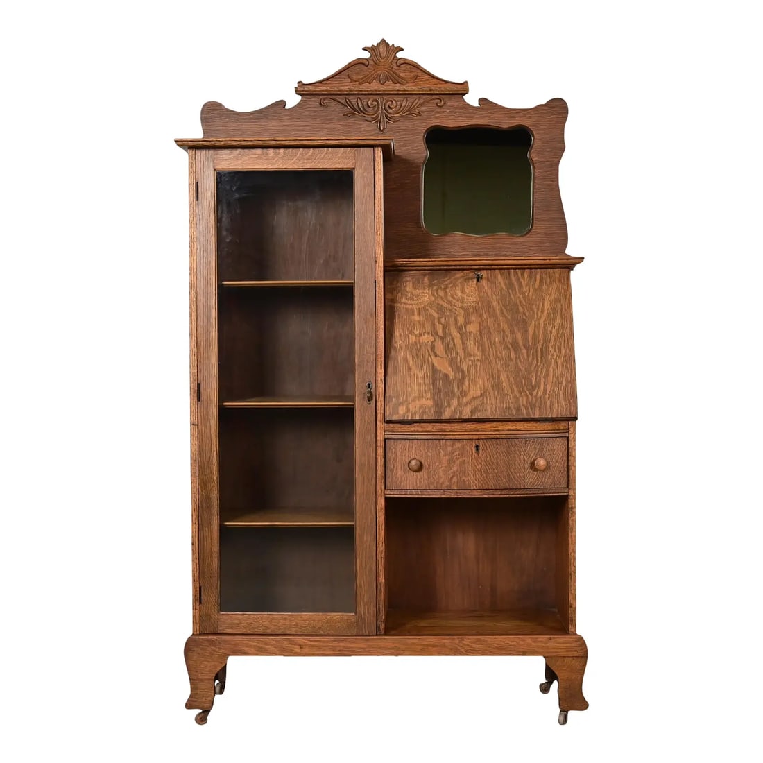 Antique Victorian Carved Tiger Oak Side-by-Side Bookcase With Drop Front Secretary Desk by Larkin: A gorgeous antique Victorian side-by-side drop front secretary desk and bookcase or display cabinet By Larkin Co. USA, Circa 1900 Carved tiger oak, with glass front door, and inset mirror. Interior sh