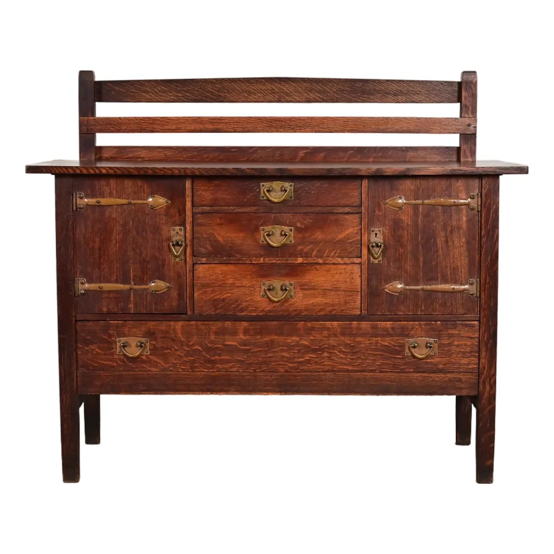 Gustav Stickley Antique Mission Oak Arts & Crafts Strap Hinge Sideboard, Circa 1910: An exceptional antique Mission or Arts & Crafts period strap hinge sideboard, buffet server, or bar cabinet with plate rack By Gustav Stickley USA, Circa 1910 Quarter sawn oak, with original hammered