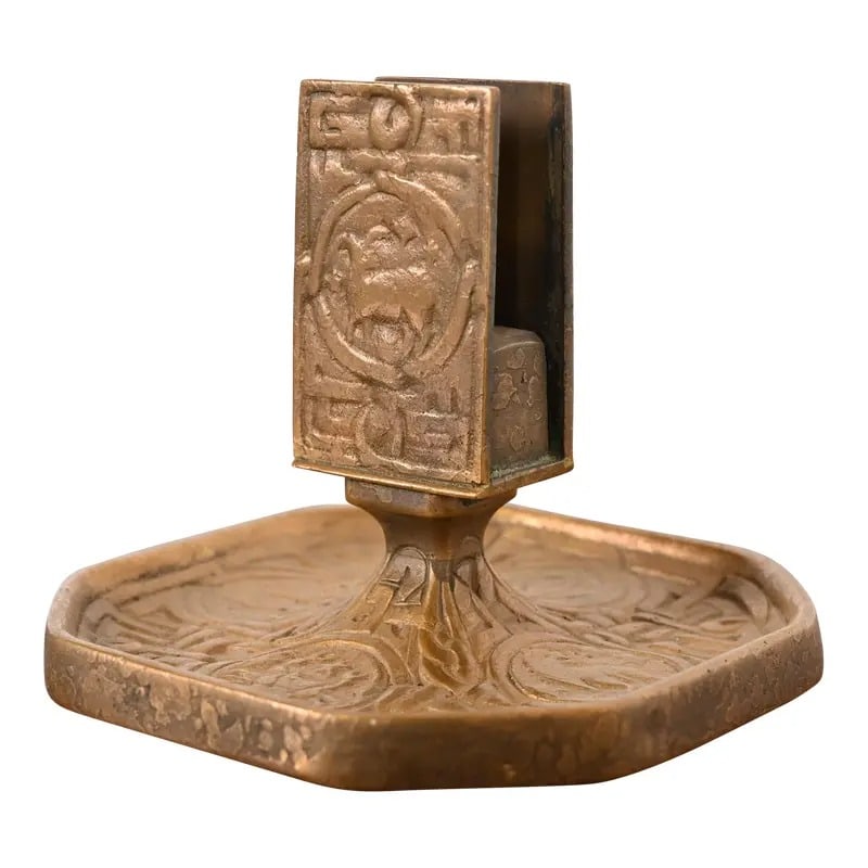 Tiffany Studios New York Zodiac Bronze Doré Match Box Holder: A gorgeous antique Arts & Crafts or Art Deco period gilt bronze match box holder featuring symbols of the Zodiac By Tiffany Studios (signed to the underside) New York, USA, Early 20th Century Measures