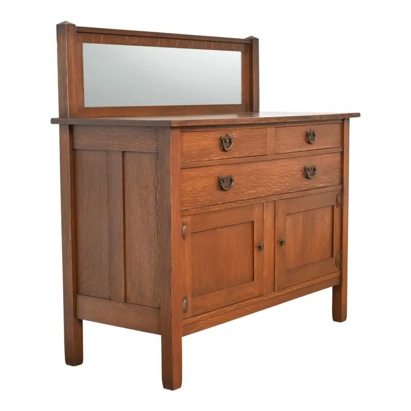 Stickley Brothers Antique Mission Oak Arts & Crafts Sideboard or Bar Cabinet, Circa 1900: A gorgeous antique Mission or Arts & Crafts period sideboard, buffet server, or bar cabinet By Stickley Brothers USA, Circa 1900 Quarter sawn oak, with mirrored backsplash, and original hammered coppe