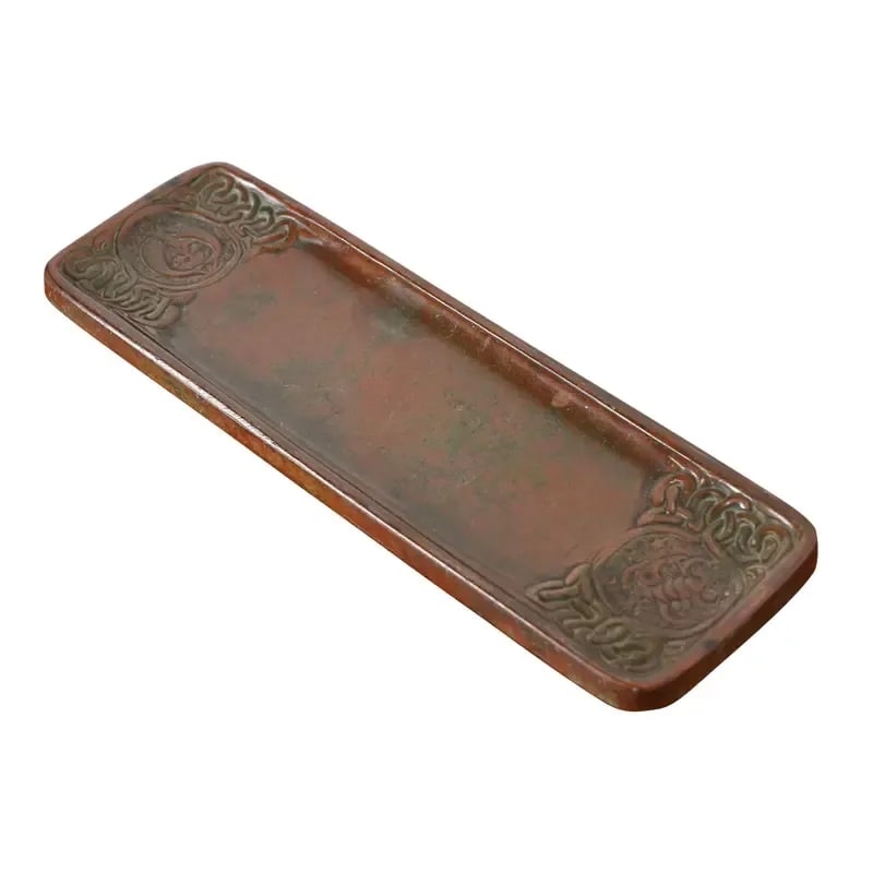 Tiffany Studios New York Zodiac Patinated Bronze Pen Tray, Circa 1910: A gorgeous antique Arts & Crafts period patinated bronze pen tray featuring Zodiac designs By Tiffany Studios (signed to the underside) New York, USA, Early 20th Century Measures: 9.75"W x 3"D x 0.5"H