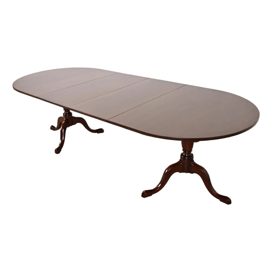 Kittinger Georgian Solid Mahogany Double Pedestal Extension Dining Table, Newly Refinished: A gorgeous Georgian, Regency, or Queen Anne style solid mahogany double pedestal extension dining table By Kittinger USA, Circa 1980s Measures: 68"W x 44"D x 29.25"H. Extends up to 104"W with two 18"