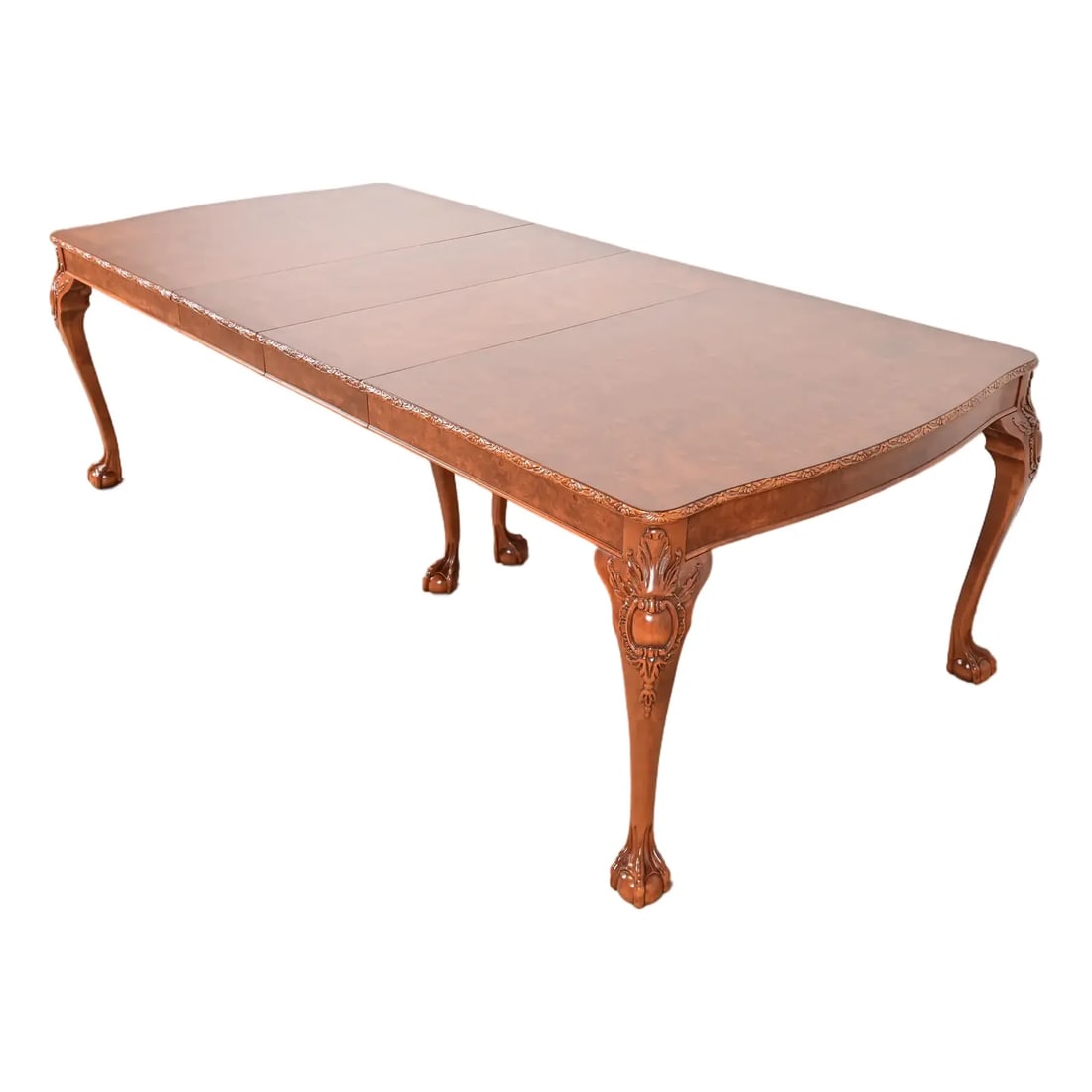 Romweber Chippendale Burl Wood Extension Dining Table, Newly Refinished: A gorgeous antique Chippendale style dining table By Romweber USA, Circa 1920s Stunning exotic burl wood, with carved cabriole legs, and ball and claw feet. Measures: 65"W x 44"D x 30"H. Extends up to