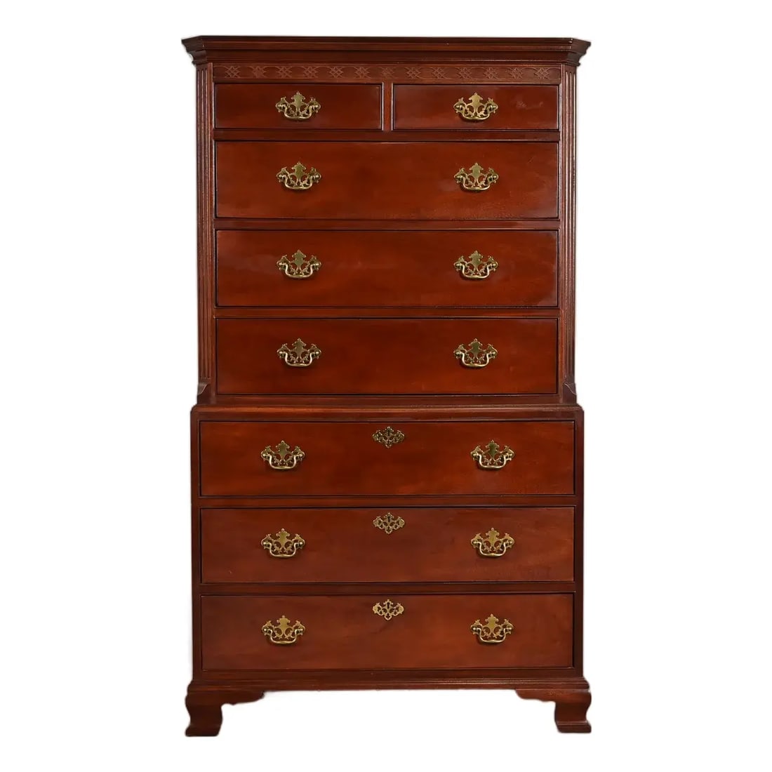 Baker Furniture Georgian Carved Mahogany Eight-Drawer Highboy Dresser: A gorgeous Georgian or Chippendale style eight-drawer highboy dresser or chest of drawers By Baker Furniture USA, Circa 1980s Beautiful carved solid mahogany, with original brass hardware. Measures: 3