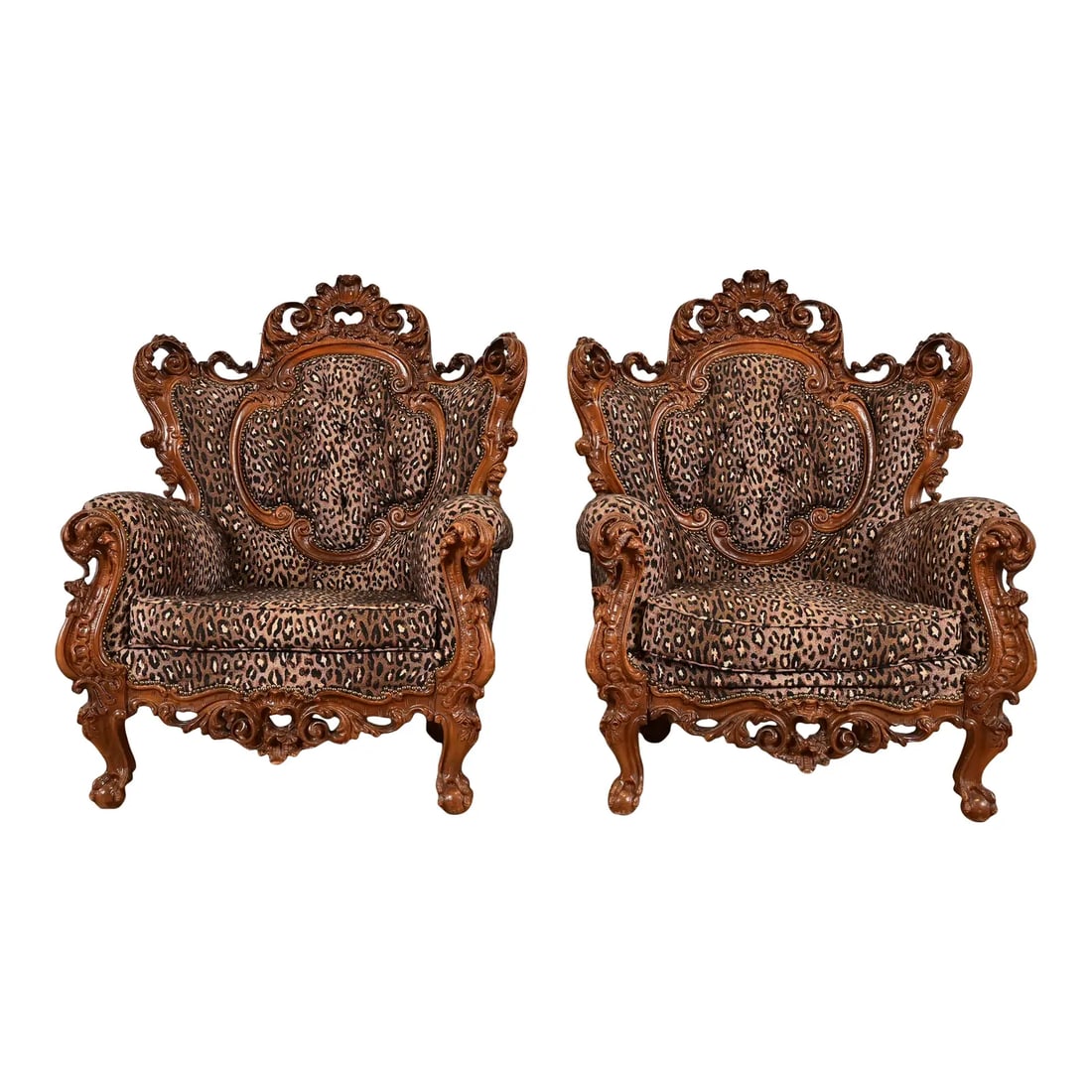 Italian Baroque Ornate Carved Walnut Throne Chairs or Lounge Chairs With Leopard Print Upholstery: A gorgeous pair of Italian Renaissance Revival or Baroque style throne chairs or lounge chairs In the manner of R.J. Horner & Co. Italy, Circa Early to Mid 20th Century Solid ornate carved walnut fram