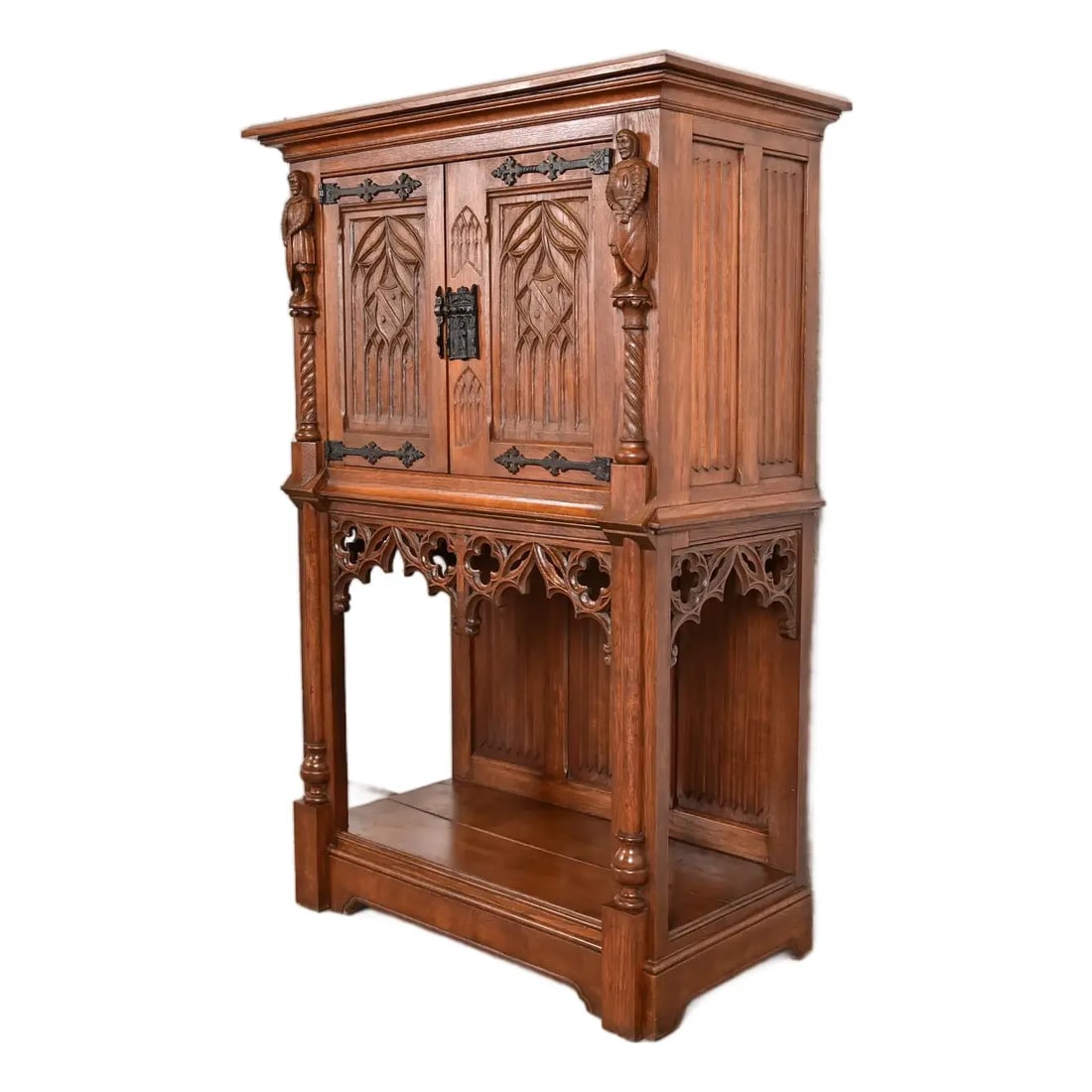 Antique Belgian Gothic Revival Carved Oak Bar Cabinet, Circa 1880s: A gorgeous antique Gothic or Renaissance Revival bar cabinet Belgium, Circa 1880s Oak, with ornate carvings including shields and knight figures, and original iron hardware. Measures: 38.5"W x 19"D x