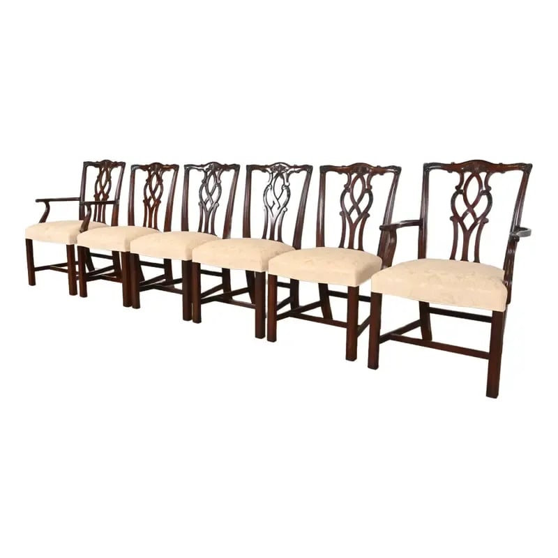 Kindel Furniture Georgian Carved Mahogany Dining Chairs, Set of Six: A gorgeous set of six Georgian or Chippendale style dining chairs By Kindel Furniture USA, 1987 Carved solid mahogany frames, with ivory damask upholstered seats. Measures: Side chairs - 20.25"W x 24"
