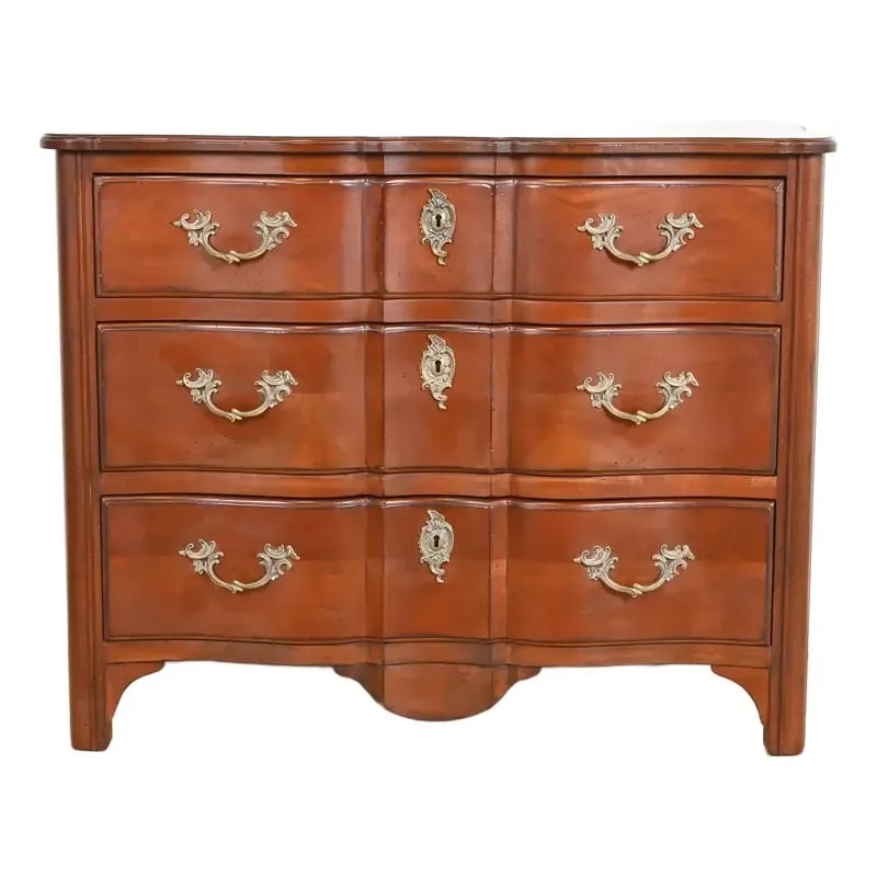 Drexel Heritage French Provincial Louis XV Carved Fruitwood Chest of Drawers: A gorgeous French Provincial Louis XV style dresser or chest of drawers By Drexel Heritage USA, Late 20th Century Measures: 43"W x 19.75"D x 34.13"H. Carved fruitwood, with original brass hardware. Ve