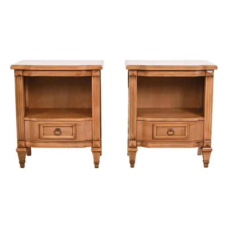 Kent Coffey French Regency Louis XVI Carved Cherry Wood Nightstands, Pair: A gorgeous pair of mid-century French Regency Louis XVI style bedside tables By Kent Coffey USA, 1960s Beautiful cherry wood, with original brass hardware. Each measures: 23"W x 15"D x 27.25"H. Very g
