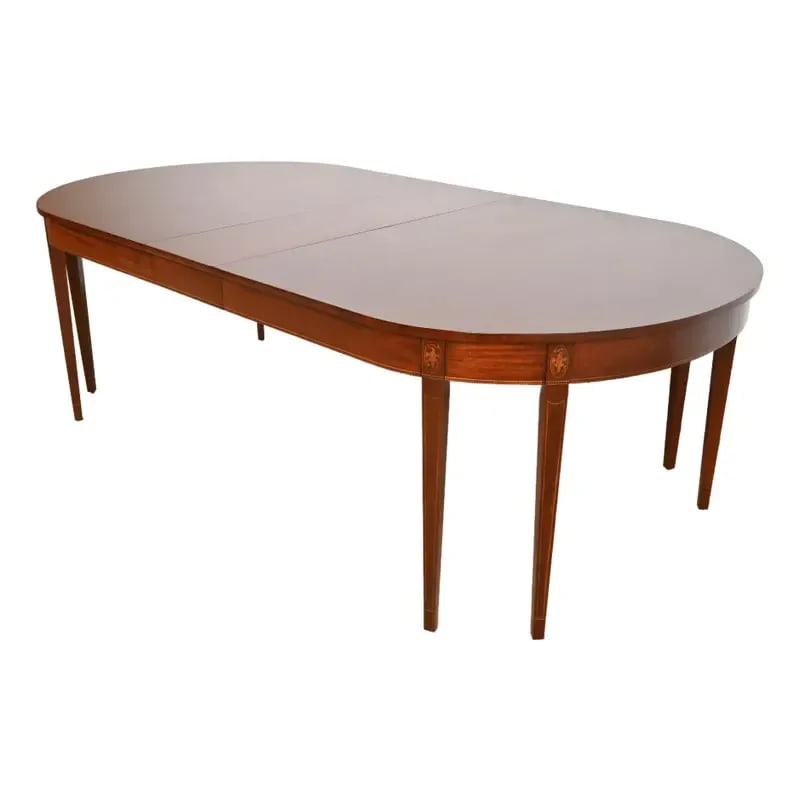 Kindel Furniture Federal Inlaid Mahogany Extension Dining Table, Newly Refinished: A beautiful Federal or Hepplewhite style extension dining table By Kindel Furniture USA, Circa 1980s Gorgeous book-matched mahogany, with inlaid satinwood marquetry. Measures: 80.75"W x 48"D x 29.5"H.
