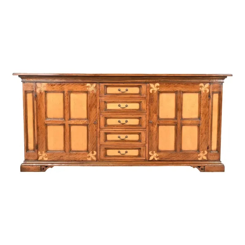 Gruppo Faber Italian Provincial Carved Oak Inlaid Maple Sideboard or Bar Cabinet: A gorgeous Italian Provincial or Rustic European sideboard, credenza, or bar cabinet By Gruppo Faber Italy, Circa Late 20th Century Carved oak and maple, with fleur-de-lis inlays and original brass ha