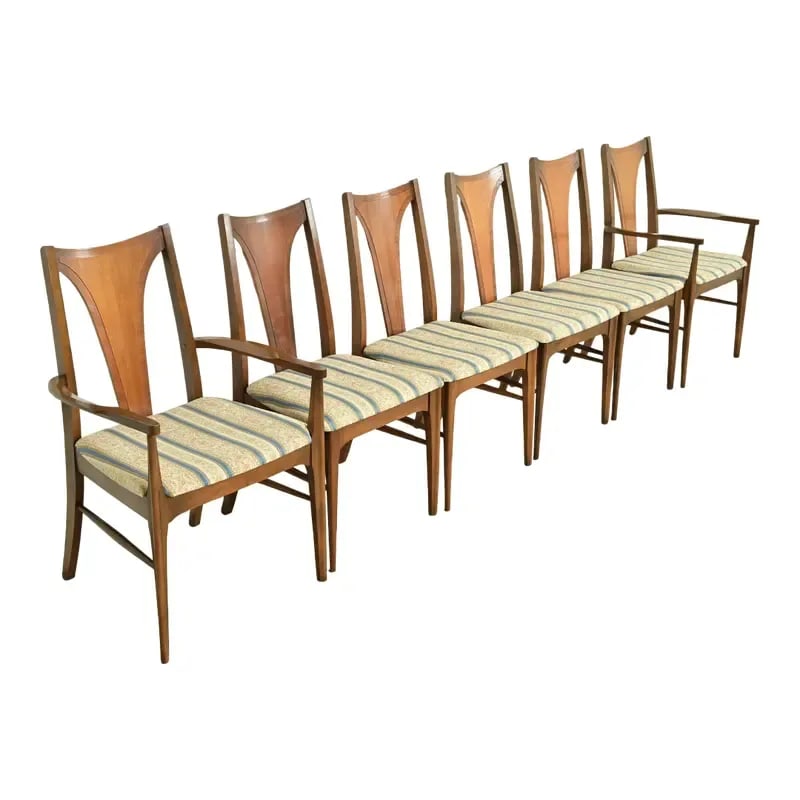 Broyhill Brasilia Mid-Century Modern Sculpted Walnut Dining Chairs, Set of Six: A gorgeous set of six Mid-Century Modern dining chairsBy Broyhill BrasiliaUSA, 1960sSculpted walnut frames, with upholstered seats.Measures:Side chairs - 19"W x 21.25"D x 36.25"H. Seat height: