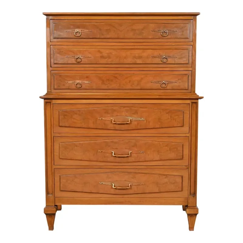 Romweber Mid-Century Hollywood Regency Walnut and Burl Wood Highboy Dresser, Circa 1960s: A gorgeous Mid-Century Modern Hollywood Regency six-drawer highboy dresserBy Romweber FurnitureUSA, Circa 1960sWalnut, with inlaid burled walnut, and original brass hardware.Measures: 40.5"W x