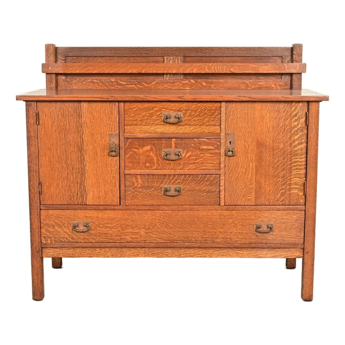 L. & J. G. Stickley Antique Mission Oak Arts & Crafts Sideboard or Bar Cabinet, Circa 1910: A gorgeous antique Mission or Arts & Crafts period sideboard, buffet server, or bar cabinet By L. & J.G. Stickley USA, Circa 1910 Quarter sawn oak, with original hammered copper hardware. Measures: 48
