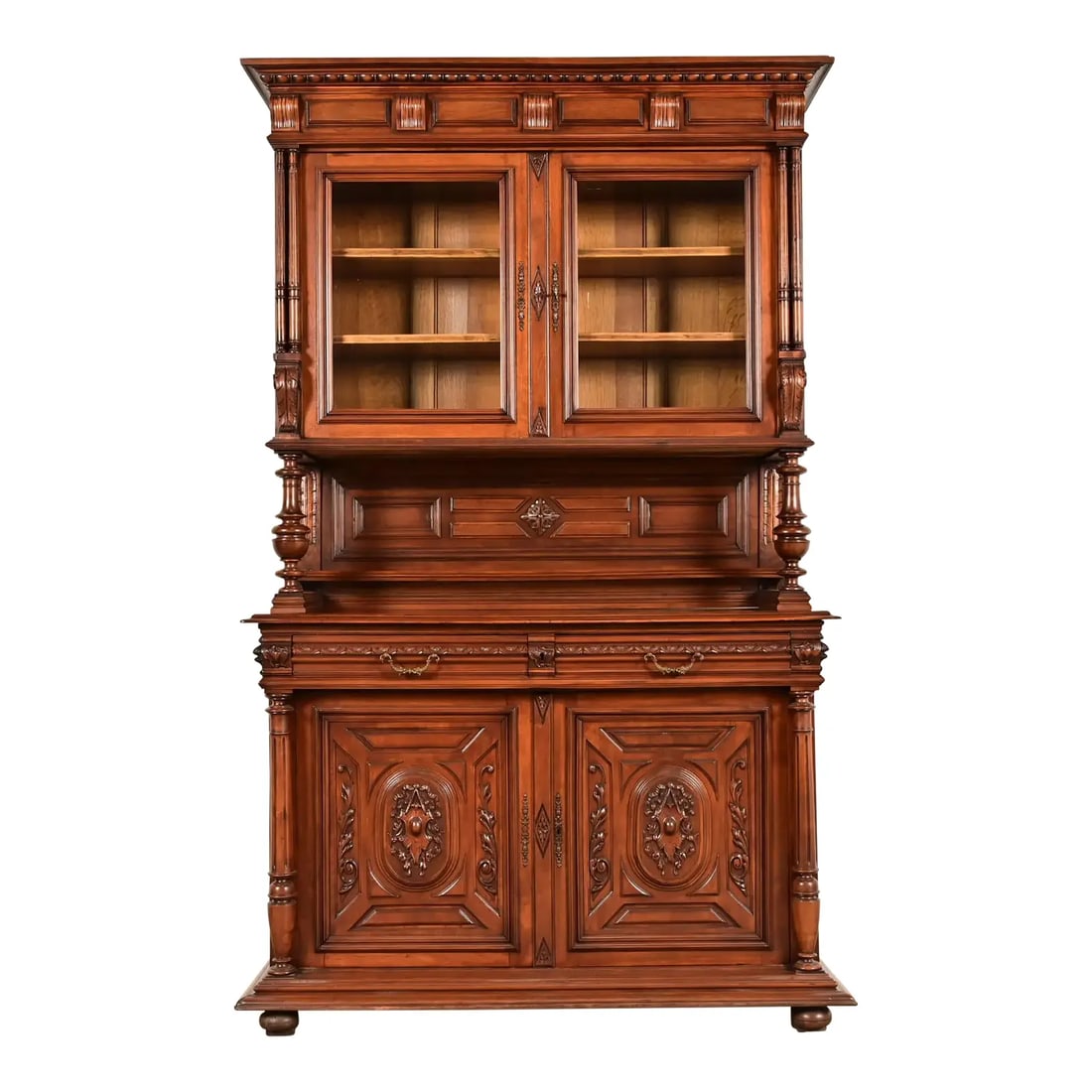 Antique French Renaissance Carved Walnut Sideboard or Bar Cabinet, Circa 1890s: A gorgeous antique French Renaissance sideboard hutch or bar cabinet France, Late 19th Century Carved walnut, with with glass front doors, and original brass hardware. Measures: 56.25"W x 22.25"D x 91