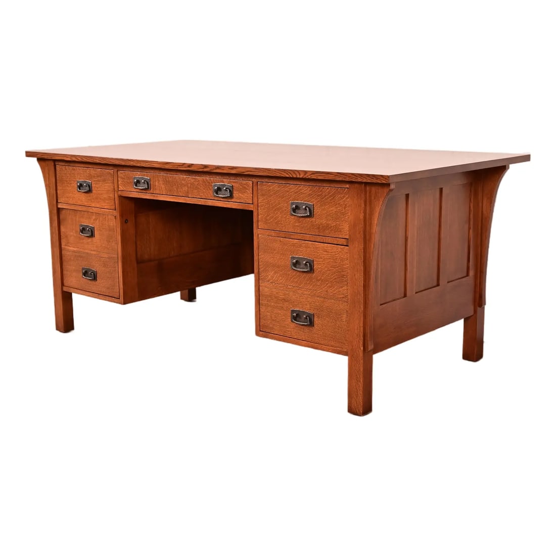 Stickley Mission Oak Arts & Crafts Executive Desk, Newly Refinished: An exceptional Mission or Arts & Crafts executive desk By Stickley USA, Circa Late 20th Century Solid quarter sawn oak, with hammered copper hardware Measures: 72"W x 36"D x 30.25"H. Professionally re