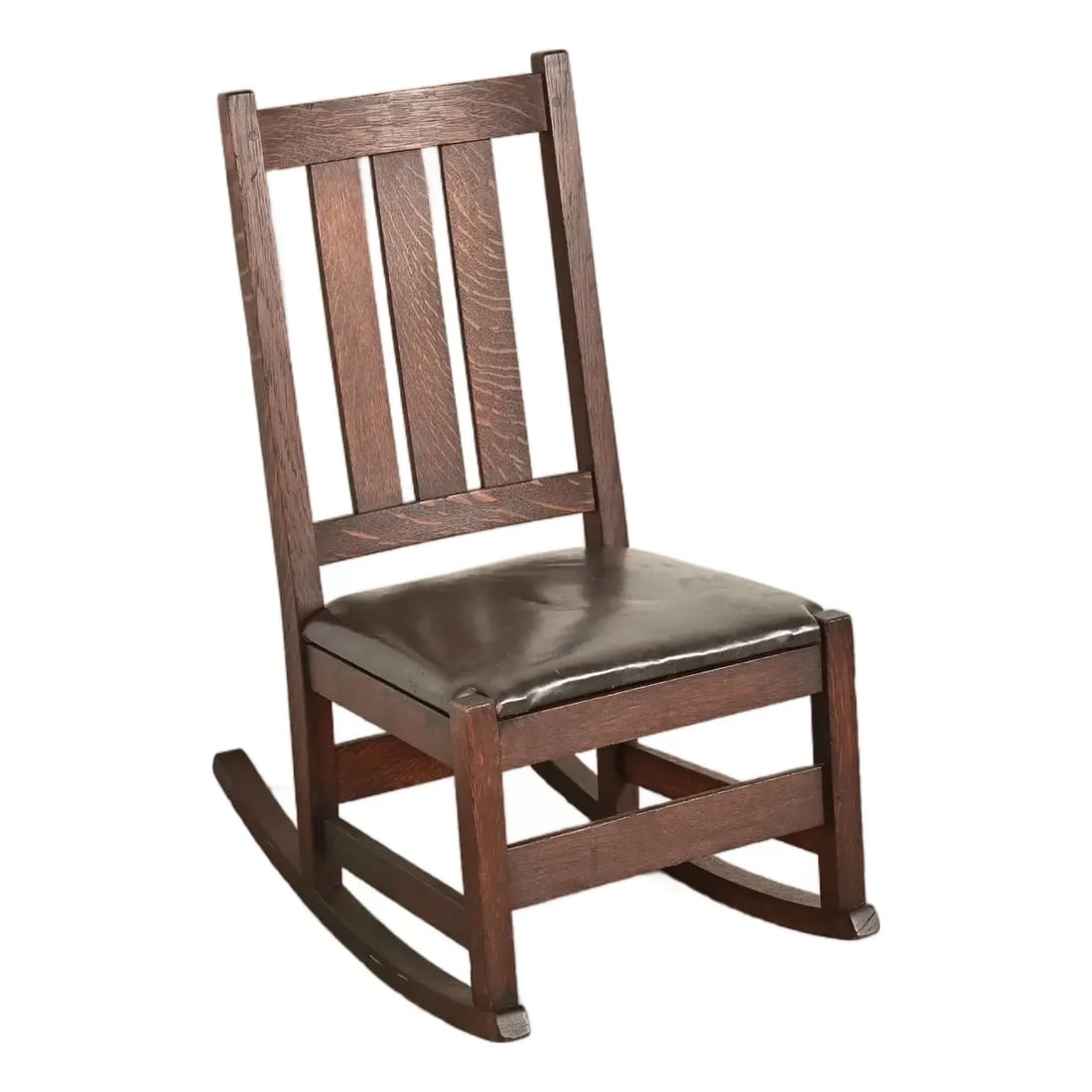L. & J. G. Stickley Antique Mission Oak Arts & Crafts Rocking Chair, Circa 1910: A gorgeous antique Mission or Arts & Crafts period rocking chair By L. & J.G. Stickley USA, Circa 1910 Quarter sawn oak, with leather upholstered seat. Measures: 17.75"W x 26.25"D x 33.75"H. Seat heig