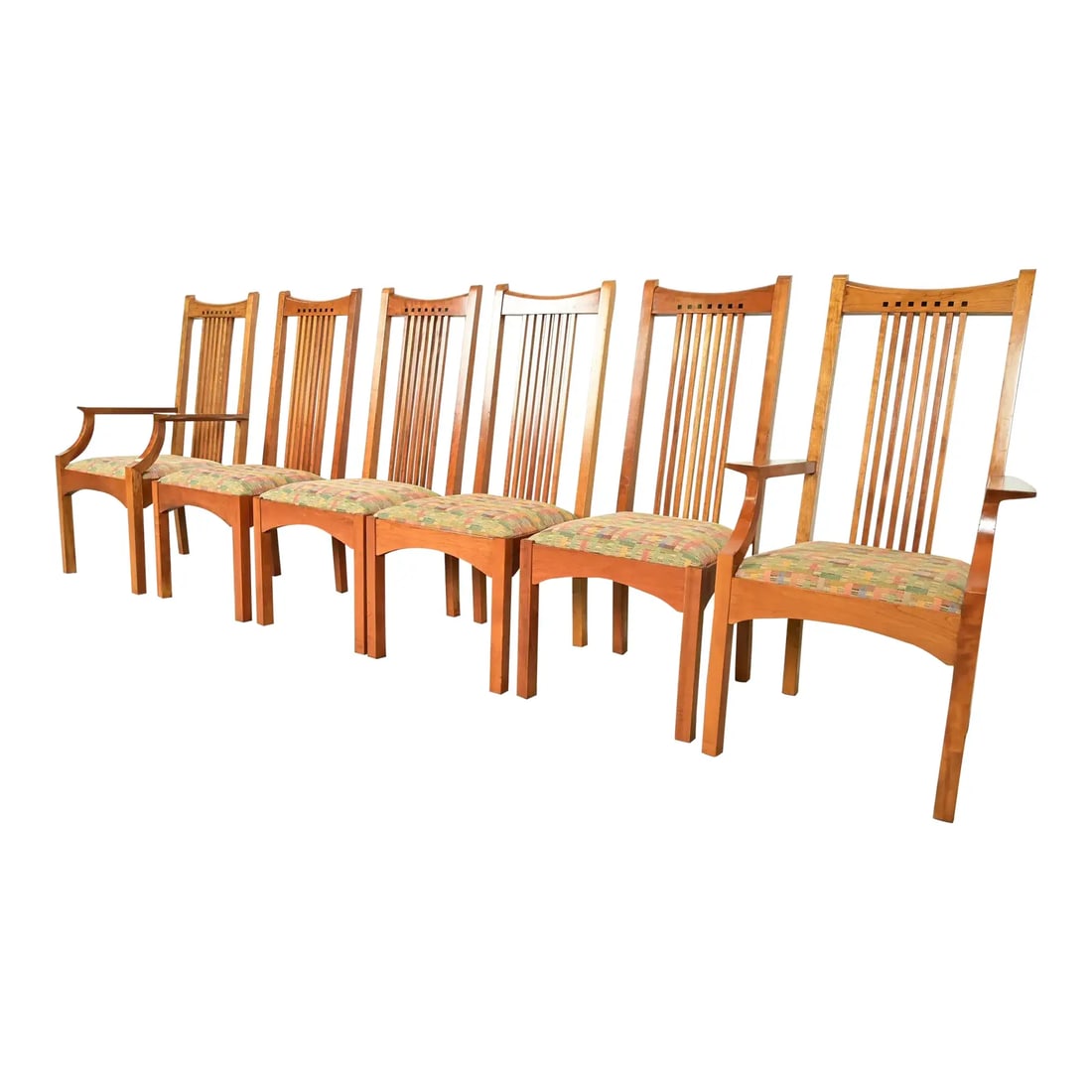 Stickley Arts & Crafts Cherry Wood High Back Spindle Dining Chairs, Set of Six: An exceptional set of six Mission or Arts & Crafts style high back spindle dining chairs By L. & J.G. Stickley USA, 1998 Solid cherry wood frames, with ebony inlay, and upholstered seats. Measures: Si