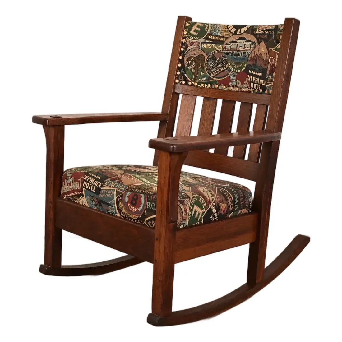 J. M. Young & Sons Antique Mission Oak Arts & Crafts Rocking Chair, Circa 1900: A gorgeous antique Mission or Arts & Crafts period rocking chair In the manner of Stickley Brothers By J.M. Young & Sons USA, Circa 1900 Solid quarter sawn oak, with custom upholstered seat and back. 