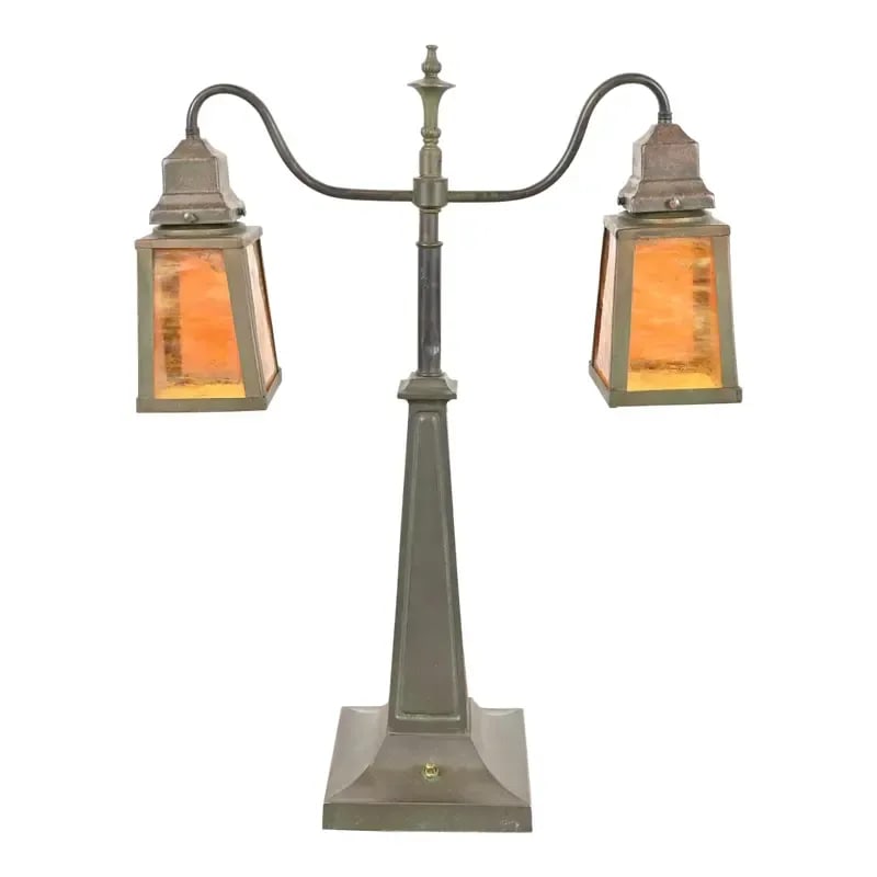 Handel Style Antique Arts & Crafts Bronze and Slag Glass Double Table Lamp, Circa 1920s: A beautiful antique Arts & Crafts double table lamp or desk lamp In the manner of Handel USA, Circa 1920s Bronze, with verdigris green patina, and slag glass shades. Measures: 18.5"W x 7"D x 25"H. Goo