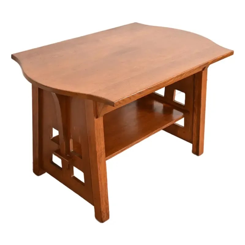 Limbert Antique Mission Oak Arts & Crafts Turtle-Top Cutout Desk or Library Table, Circa 1910: A rare and exceptional antique Mission or Arts & Crafts period quarter sawn oak turtle-top cutout library table or writing desk By Charles P. Limbert Co. USA, Circa 1910 Measures: 47.25"W x 30"D x 29.