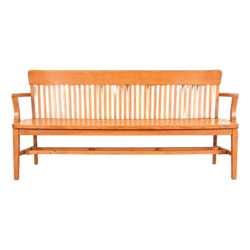 Antique Arts & Crafts Solid Oak Lawyer's Bench: An exceptional antique Arts & Crafts solid oak spindle back banker or lawyer bench USA, Early 20th Century Measures: 75.63"W x 22"D x 34"H. Seat height: 17.63". Arm height: 27". Very good original vin